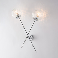 Applique moderna 2 sfere trasparenti incrocio cromato 43660 DEMETRA LUCI MODERNE