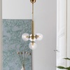 Immagine aggiuntiva di Lampadario bronzato 4 sfere trasparenti linea a V vetro trasparente artistico