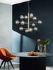 Immagine aggiuntiva di Lampadario design radiale oro sfere ambra 12 luci E14 grandi living  44825