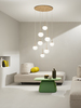 Immagine aggiuntiva di Lampadario grappolo dorato mid century chic 8 sfere distese  44742