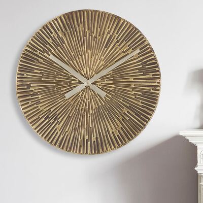 Orologio particolare in metallo bronzato con zigrinature 50 cm  40529