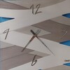 Seconda foto orologio design intagli tortora
