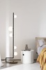 Particolare di Piantana design moderno nero con sferette su stelo a elle BIRDS PT5 IDEAL LUX