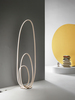 Piantana LED dimmerabile oro con curve luminose slanciate concentriche  45005