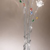 Dettaglio Piantana 5 luci steli sottili fiori sbocciati cristallo