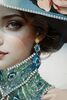 Ulteriore dettaglio di Quadro donna chic con cappello blu e fiore rosa 62x92  43147