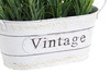 Particolare di vaso in metallo decoro provenzale con lavanda